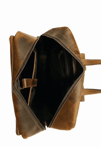 Vintage buff leather backpack with premium YKK zippers, separate 17-inch laptop space, and 8kg carrying capacity.